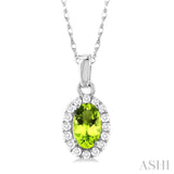 5x3 MM Oval Shape Peridot and 1/20 Ctw Single Cut Diamond Halo Semi-Precious Pendant with Chain in 14K White Gold