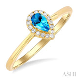 5x3 MM Pear Shape Blue Topaz and 1/20 Ctw Single Cut Diamond Halo Semi-Precious Ring in 14K Yellow Gold