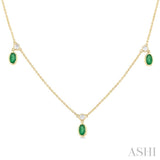 5x3 MM Oval Shape Emerald and 1/4 Ctw Round Cut Diamonds Precious Station Necklace in 14K Yellow Gold