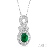 6x4 MM Oval Cut Emerald and 1/5 ctw Round Cut Diamond Pendant in 10K White Gold with Chain