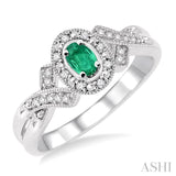 5x3 mm Oval Cut Emerald and 1/50 Ctw Single Cut Diamond Ring in Sterling Silver