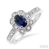 6x4 mm Oval Cut Sapphire and 1/20 ctw Single Cut Diamond Ring in Sterling Silver
